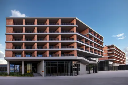 Taoyichaosheng Hotel (Taoxichuan Cultural and Creative Block) Отели в г. Цзиндечжэнь