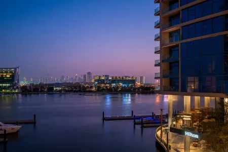 Hilton Dubai Creek Hotel & Residences Отели рядом с достопримечательностью «Dubai Driving Center Al Qusais 1»