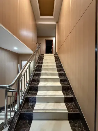 Yongxing Tiantian Holiday Hotel Отели рядом с достопримечательностью «Longhuashan Park»