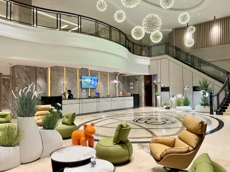 Hiatu Garden Hotel Отели рядом с достопримечательностью «Xiaolangang International Huogui Shipside»