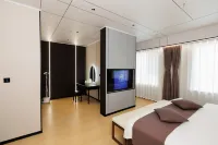 Kunda Hotel Hotel dekat Pengzhou Sports Center