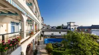 Floral Hotel·Xingfugang Bokewan Hotel (Dali Yanxi Swan Branch) Hotels in Dali