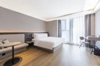 โรงแรมHanTing (ถนนหยางกวง หนานหลงหู เจิ้งโจว) - ที่มีที่จอดรถ