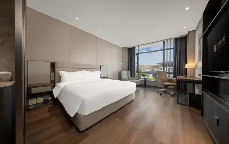 Tianfu International Hotel Complex Rongxiu Courtyard Отели в г. Цзяньян