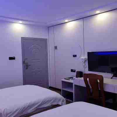 Xingguo Taojia Business Motel Rooms