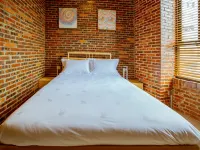 Zhigao Academy Homestay (Lingnan Normal University Chikan Old Street Scenic Area) - พร้อมระเบียง