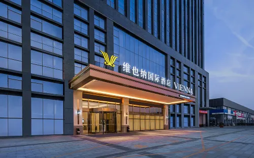 Vienna International Hotel(Zhoukou Wanguo Car World Store)