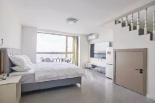 Qiyu Hotel Apartment (Harbin Ice and Snow World Shimao Avenue Metro Station Branch)