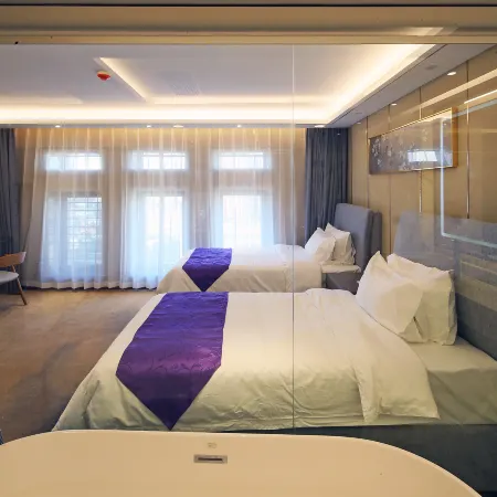 Haotai Holiday Inn (Zhongshan District Gangdong Fifth Street Punch Point Branch)