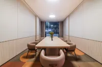 Orange Puning Commodity City Hotel