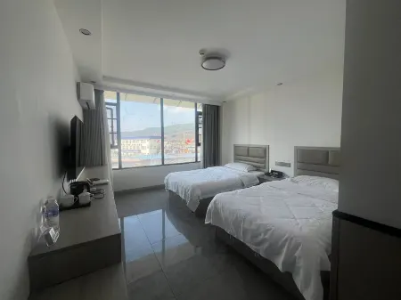 Butuo Baiyue Xiangzi Grand Hotel Отели в г. Буто