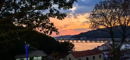 Yangshandao Xiaodaorenjia Homestay Отели рядом с достопримечательностью «Gaogongdaofenghuangwan Sceneic Area»