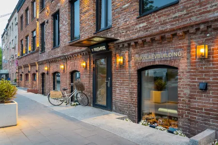 Бутик-Апарт Николаев Билдинг Отели рядом с достопримечательностью «выстрелка о времени»