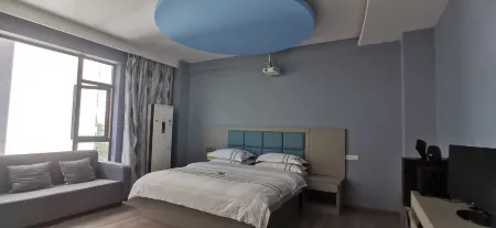 Yuanyang Yunshang Shanshui Theme Hotel Отели рядом с достопримечательностью «Nanshazhen»