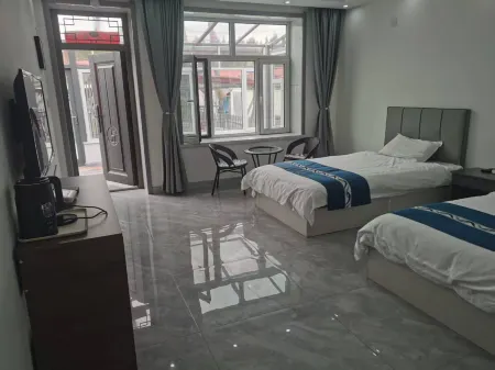 Senyi Homestay Отели в г. Тахэ