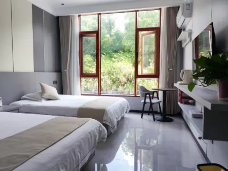 Shitai Guniujiang Creek Tea Serenity Homestay Отели рядом с достопримечательностью «Peng Lai Xian Dong»