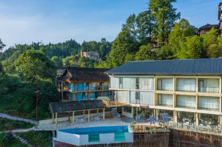 Longji Guyu Mountain View Homestay Отели рядом с достопримечательностью «Huangluo Village of Yao Nationality»