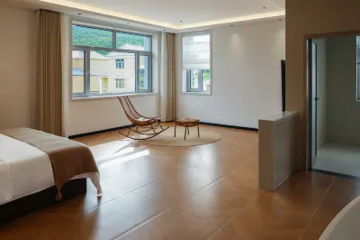 Qimu Homestay Hotel 이얼스진 호텔