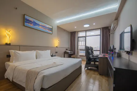 Pipixiong E-Sports Hotel (Xiangxiang Railway Station) Отели в г. Сянсян