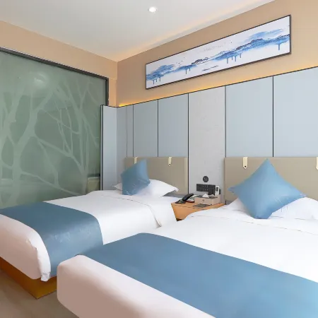 HuaQi Hotel (Changshu Yushan Fangta CityWalk Inn))