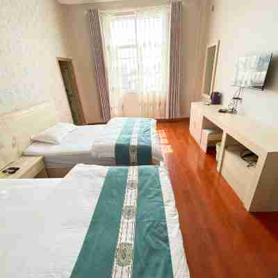 Jiaxin Hotel Rooms