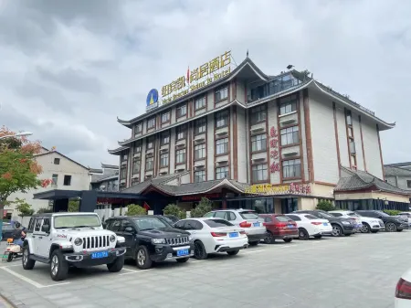 New Beacon Yunman Internation Hotel (Yingshan Tourist Center Chaxiang Small Town)
