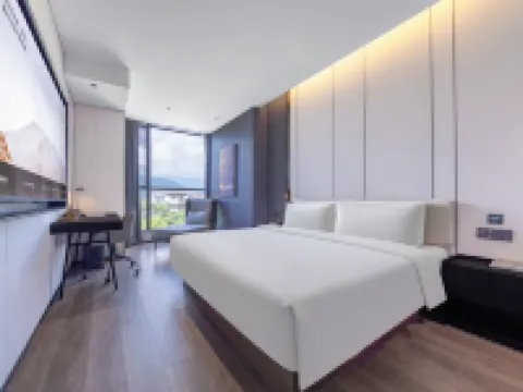 โรงแรมเอทัวร์ สถานีรถไฟ เอ๋อเหม่ยซาน ทะเลสาบเอ็กซิ่ว โรงแรมในเอ๋อเหม่ยซาน