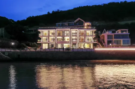 Qiying Shijian Sea Resort Seaview Homestay (Ningbo Xiangshan Shipu Branch) Отели рядом с достопримечательностью «Huangcheng Beach»