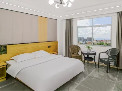 Morning Light Hotel in Jinghong City, Xishuangbanna (Water Splashing Square Branch) Отели в г. Автовокзал Цзинхун