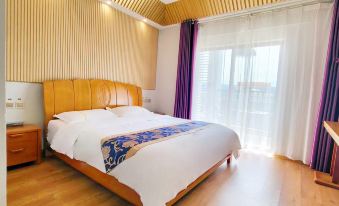 JING AI Holiday Hotel