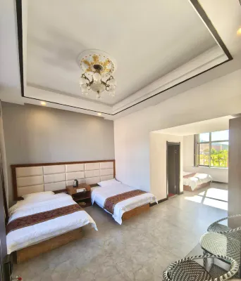 Hotel Отели рядом со станцией Xinqing Railway Station