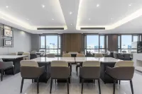 Yueqing Yueyouju Hotel (Jiali Square ) Отели в г. Юэцин