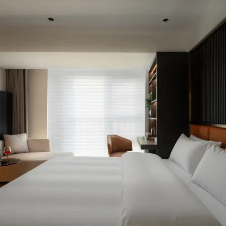 Yunjing Bopan Hotel (Panzhou Donghu Park Hongguo Small Square Branch)