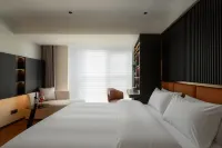 Yunjing Bopan Hotel (Panzhou Donghu Park Hongguo Small Square Branch)