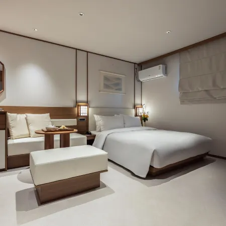 Gangneung Hotel Flow-er Отели рядом с достопримечательностью «Пляж Анмок»