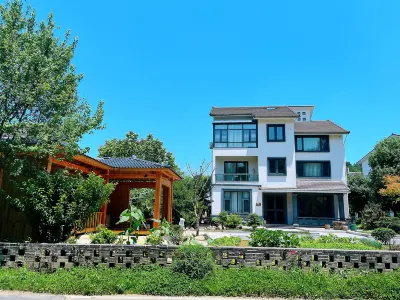 安吉畔兮居（田園魯家景區店） 繽紛摩天輪附近的飯店