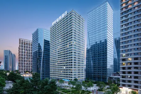 Ginza Mani Hotel (Jinan Olympic Center MixC Store) Отели рядом с достопримечательностью «Shandong Open University»