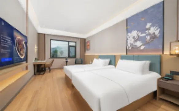 Magnotel Hotel (Xinyangdong Railway Station)