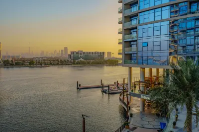 Hilton Dubai Creek Hotel & Residences Отели в г. Дубай