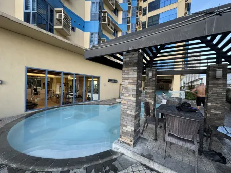 Grand Riviera Suites Отели рядом с достопримечательностью «National Library of the Philippines»