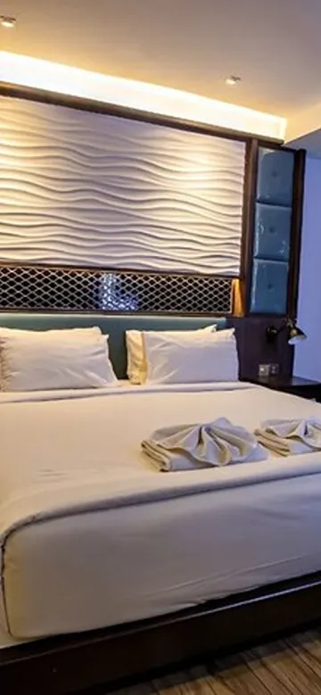 ห้องดีลักซ์ เตียงใหญ่ 1 เตียง