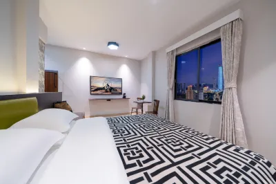 古奈公寓（東莞國貿中心店） Hotels near Huangqishan Chengshi Park