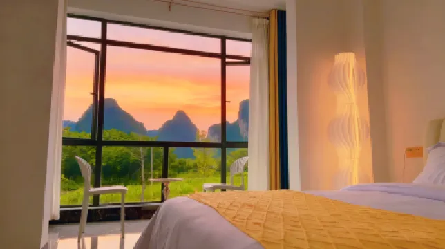 Qixili Homestay (Yangshuo Yulong River Lansheng Bridge Pier) โรงแรมใกล้หมู่บ้านเต่า