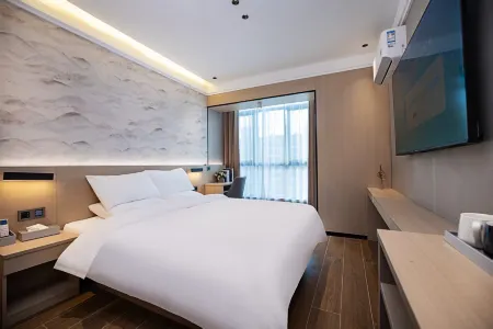 Senman Hotel (Xinxiang Wanda Plaza Henan Normal University) Отели рядом со станцией Xinxiang Railway Station