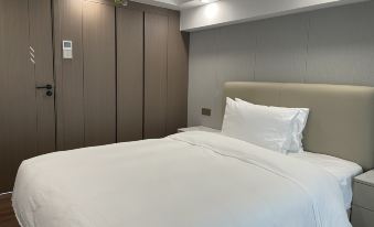 Xiaocheng International Apartment Hotel