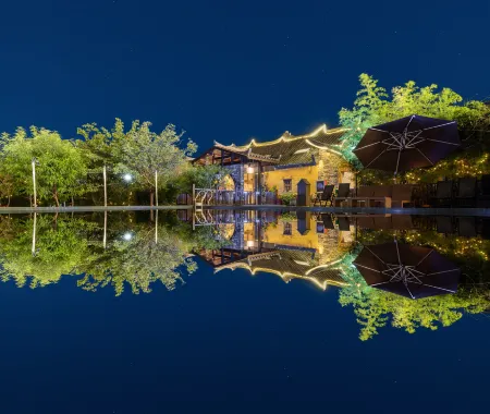 Future Homestay （Xingyi Wanfenglin Store） Отели в г. Синъи