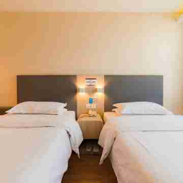 Huaya Hotel (Guangrao Dawang Bus Station Quanfuyuan Plaza) Rooms