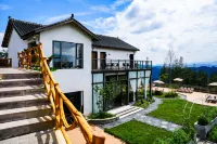 Manchon Village and Ewha Island Guofeng Camp Hotel in zona Chongqing Qianye Grassland Scenic Spot