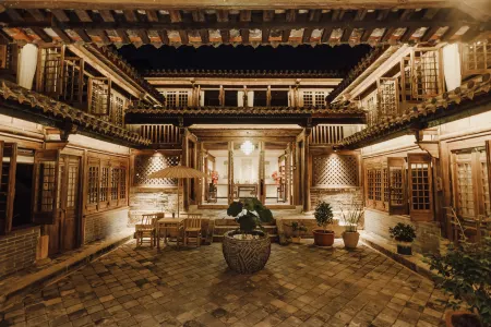 Shipingpingyuan Old Residence Homestay Отели рядом с достопримечательностью «Shiping Yilonghu National Wetland Park»