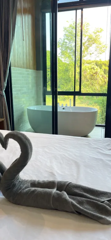 ห้องพักเตียงเดี่ยวพร้อมอ่างอาบน้ำ